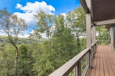 Wake up to the sun-drenched beauty of the Blue Ridge Mountains on Wildcat Cliffs Country Club in North Carolina - for sale on GolfHomes.com, golf home, golf lot