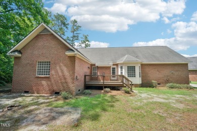 EXQUISITE 3 bed, 2.5 bath brick ranch style home settled on a on Gates Four Golf and Country Club in North Carolina - for sale on GolfHomes.com, golf home, golf lot