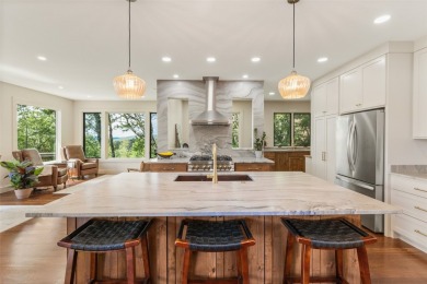 Wake up to the sun-drenched beauty of the Blue Ridge Mountains on Wildcat Cliffs Country Club in North Carolina - for sale on GolfHomes.com, golf home, golf lot