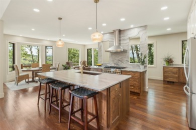 Wake up to the sun-drenched beauty of the Blue Ridge Mountains on Wildcat Cliffs Country Club in North Carolina - for sale on GolfHomes.com, golf home, golf lot