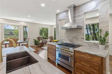 Wake up to the sun-drenched beauty of the Blue Ridge Mountains on Wildcat Cliffs Country Club in North Carolina - for sale on GolfHomes.com, golf home, golf lot