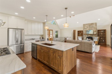Wake up to the sun-drenched beauty of the Blue Ridge Mountains on Wildcat Cliffs Country Club in North Carolina - for sale on GolfHomes.com, golf home, golf lot