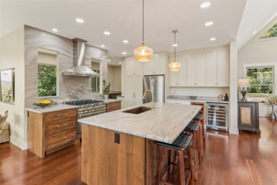 Wake up to the sun-drenched beauty of the Blue Ridge Mountains on Wildcat Cliffs Country Club in North Carolina - for sale on GolfHomes.com, golf home, golf lot