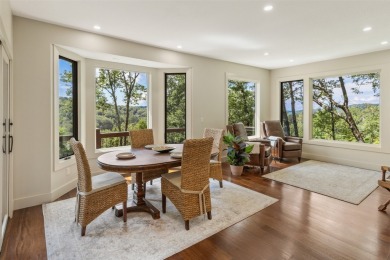 Wake up to the sun-drenched beauty of the Blue Ridge Mountains on Wildcat Cliffs Country Club in North Carolina - for sale on GolfHomes.com, golf home, golf lot