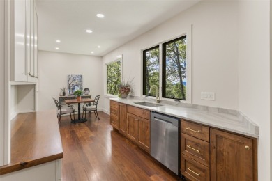 Wake up to the sun-drenched beauty of the Blue Ridge Mountains on Wildcat Cliffs Country Club in North Carolina - for sale on GolfHomes.com, golf home, golf lot