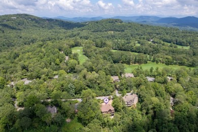 Wake up to the sun-drenched beauty of the Blue Ridge Mountains on Wildcat Cliffs Country Club in North Carolina - for sale on GolfHomes.com, golf home, golf lot