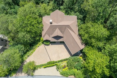 Wake up to the sun-drenched beauty of the Blue Ridge Mountains on Wildcat Cliffs Country Club in North Carolina - for sale on GolfHomes.com, golf home, golf lot