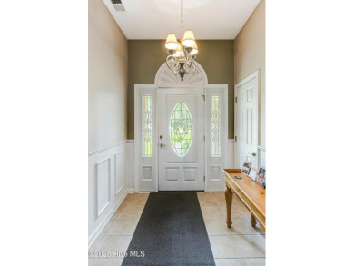 You are going to love this all brick home situated on a large on Carolina Shores Golf Course in North Carolina - for sale on GolfHomes.com, golf home, golf lot