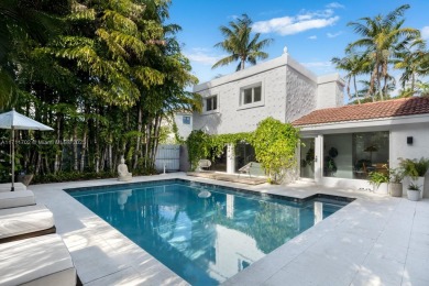 This stunning 6-bedroom Mediterranean-style home offers 3,770 SF on Miami Beach Golf Club in Florida - for sale on GolfHomes.com, golf home, golf lot