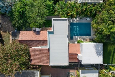 This stunning 6-bedroom Mediterranean-style home offers 3,770 SF on Miami Beach Golf Club in Florida - for sale on GolfHomes.com, golf home, golf lot