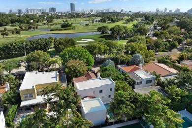 This stunning 6-bedroom Mediterranean-style home offers 3,770 SF on Miami Beach Golf Club in Florida - for sale on GolfHomes.com, golf home, golf lot