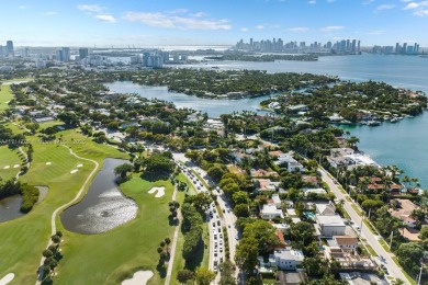 This stunning 6-bedroom Mediterranean-style home offers 3,770 SF on Miami Beach Golf Club in Florida - for sale on GolfHomes.com, golf home, golf lot