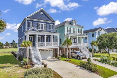 This home is coastal living at his finest. Rising majestically on Myrtlewood Golf Course and Club  in South Carolina - for sale on GolfHomes.com, golf home, golf lot