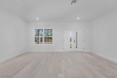 Brand-New Home on Oversized .65-Acre Lot in Sun 'N Lake on Sun n Lake Golf and Country Club in Florida - for sale on GolfHomes.com, golf home, golf lot