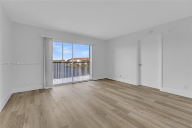 BEST LAKE VIEW & TASTEFULLY REMODELED!!! in Century Village on Flamingo Lakes Country Club in Florida - for sale on GolfHomes.com, golf home, golf lot