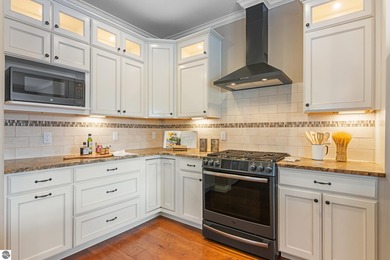 Golf course living o Just off the 11th fairway of The Bear o on Grand Traverse Resort and Spa in Michigan - for sale on GolfHomes.com, golf home, golf lot