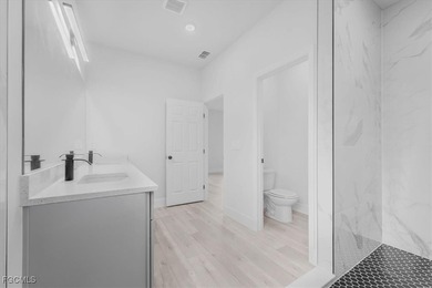 Brand-New Home on Oversized .65-Acre Lot in Sun 'N Lake on Sun n Lake Golf and Country Club in Florida - for sale on GolfHomes.com, golf home, golf lot