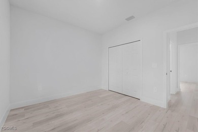 Brand-New Home on Oversized .65-Acre Lot in Sun 'N Lake on Sun n Lake Golf and Country Club in Florida - for sale on GolfHomes.com, golf home, golf lot