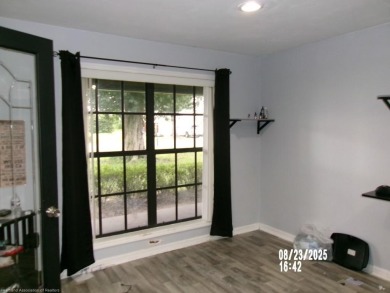 A Grand Size home in Manor Hill of Sun N Lake Estates. Right on on Sun n Lake Golf and Country Club in Florida - for sale on GolfHomes.com, golf home, golf lot