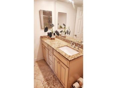 Experience the relaxation of maintenance free living in Palm on Palm Aire Country Club of Sarasota in Florida - for sale on GolfHomes.com, golf home, golf lot