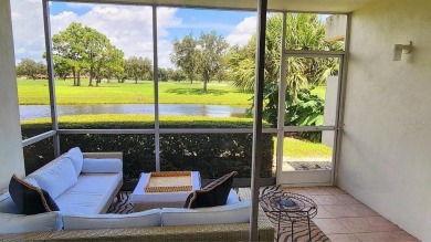 Experience the relaxation of maintenance free living in Palm on Palm Aire Country Club of Sarasota in Florida - for sale on GolfHomes.com, golf home, golf lot
