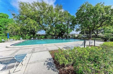 Experience the relaxation of maintenance free living in Palm on Palm Aire Country Club of Sarasota in Florida - for sale on GolfHomes.com, golf home, golf lot