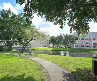 NEWLY REDUCED AND NEGOTIABLE PRICE. CENTRALLY LOCATED UPDATED 1 on Sunrise Lakes Phase IV Golf Course in Florida - for sale on GolfHomes.com, golf home, golf lot