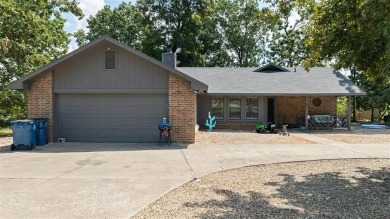 Just minutes from Hwy 49 and nestled behind Lake Loch Lomond on Bella Vista Country Club - Highlands in Arkansas - for sale on GolfHomes.com, golf home, golf lot