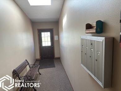 This charming 2 bedroom, 2 1/2 bath upper level condo offers the on Garner Golf and Country Club in Iowa - for sale on GolfHomes.com, golf home, golf lot