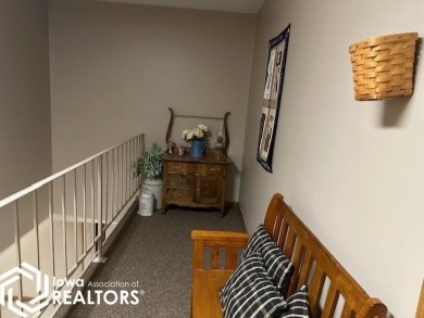 This charming 2 bedroom, 2 1/2 bath upper level condo offers the on Garner Golf and Country Club in Iowa - for sale on GolfHomes.com, golf home, golf lot