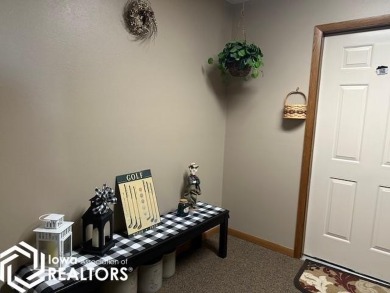 This charming 2 bedroom, 2 1/2 bath upper level condo offers the on Garner Golf and Country Club in Iowa - for sale on GolfHomes.com, golf home, golf lot