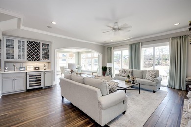 Wonderful coastal vibe home overlooking Cunning Lake. Coveted on The Reserve Club At Woodside Plantation in South Carolina - for sale on GolfHomes.com, golf home, golf lot