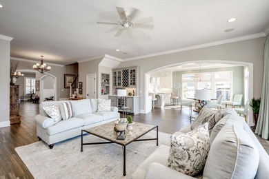 Wonderful coastal vibe home overlooking Cunning Lake. Coveted on The Reserve Club At Woodside Plantation in South Carolina - for sale on GolfHomes.com, golf home, golf lot