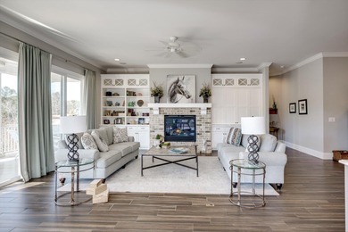 Wonderful coastal vibe home overlooking Cunning Lake. Coveted on The Reserve Club At Woodside Plantation in South Carolina - for sale on GolfHomes.com, golf home, golf lot