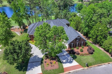 Stately home with stunning views overlooking Spalding Lake on Woodside Plantation Country Club in South Carolina - for sale on GolfHomes.com, golf home, golf lot