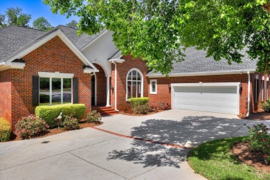 Stately home with stunning views overlooking Spalding Lake on Woodside Plantation Country Club in South Carolina - for sale on GolfHomes.com, golf home, golf lot