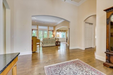 Stately home with stunning views overlooking Spalding Lake on Woodside Plantation Country Club in South Carolina - for sale on GolfHomes.com, golf home, golf lot