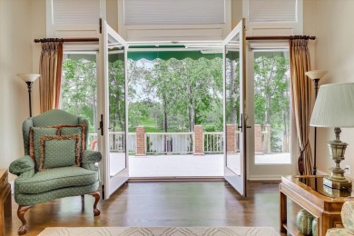 Stately home with stunning views overlooking Spalding Lake on Woodside Plantation Country Club in South Carolina - for sale on GolfHomes.com, golf home, golf lot