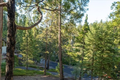 Nestled in the beautiful Sierra Nevada Mountains, this inviting on Sequoia Woods Country Club in California - for sale on GolfHomes.com, golf home, golf lot