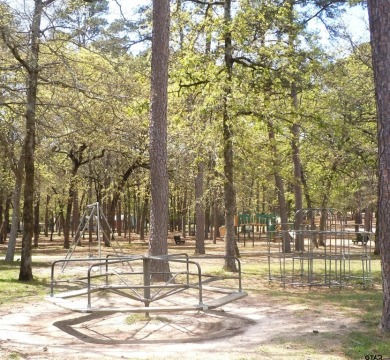 Sellers will pay initiation fee with acceptable offer on this on Holly Lake Ranch Golf Club in Texas - for sale on GolfHomes.com, golf home, golf lot