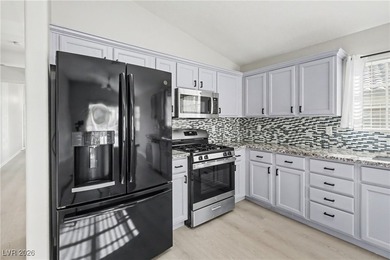 This beautifully updated single-story home offers 3 spacious on Los Prados Golf Course in Nevada - for sale on GolfHomes.com, golf home, golf lot