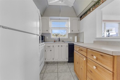 Enjoy peaceful living in this spacious 1-bedroom, 1.5-bath on Hillsboro Pines Golf in Florida - for sale on GolfHomes.com, golf home, golf lot