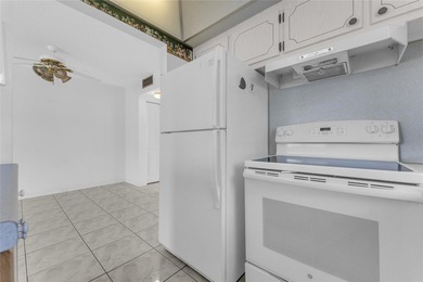 Enjoy peaceful living in this spacious 1-bedroom, 1.5-bath on Hillsboro Pines Golf in Florida - for sale on GolfHomes.com, golf home, golf lot