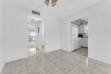 Enjoy peaceful living in this spacious 1-bedroom, 1.5-bath on Hillsboro Pines Golf in Florida - for sale on GolfHomes.com, golf home, golf lot