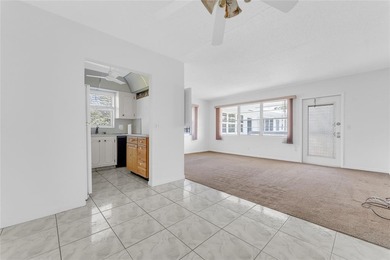 Enjoy peaceful living in this spacious 1-bedroom, 1.5-bath on Hillsboro Pines Golf in Florida - for sale on GolfHomes.com, golf home, golf lot