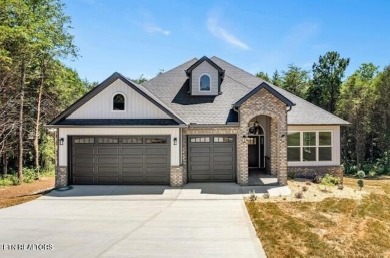 Seller's job transfer brings this barely lived in -one year old on Tellico Village Golf Club in Tennessee - for sale on GolfHomes.com, golf home, golf lot