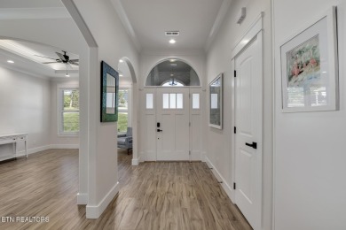 Seller's job transfer brings this barely lived in -one year old on Tellico Village Golf Club in Tennessee - for sale on GolfHomes.com, golf home, golf lot