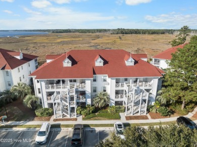 Breathtaking views of the Cape Fear River from this lovely on Beau Rivage Golf and Resort in North Carolina - for sale on GolfHomes.com, golf home, golf lot