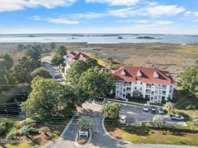 Breathtaking views of the Cape Fear River from this lovely on Beau Rivage Golf and Resort in North Carolina - for sale on GolfHomes.com, golf home, golf lot