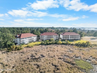 Breathtaking views of the Cape Fear River from this lovely on Beau Rivage Golf and Resort in North Carolina - for sale on GolfHomes.com, golf home, golf lot